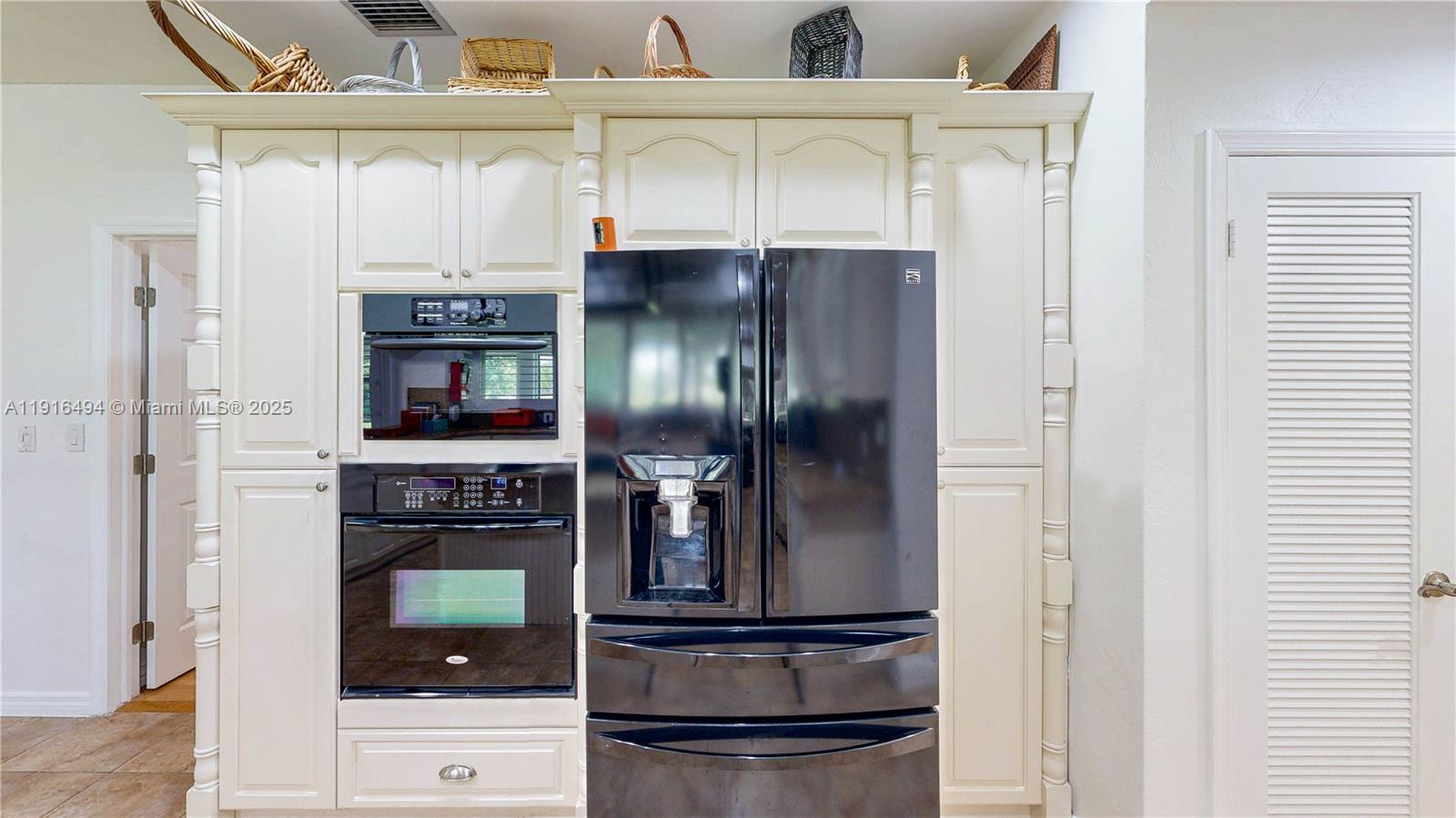 24545 Southwest 192nd Avenue Homestead, FL 33031 - Photo 20 of 91 a kitchen with stainless steel appliances granite countertop a refrigerator and a sink