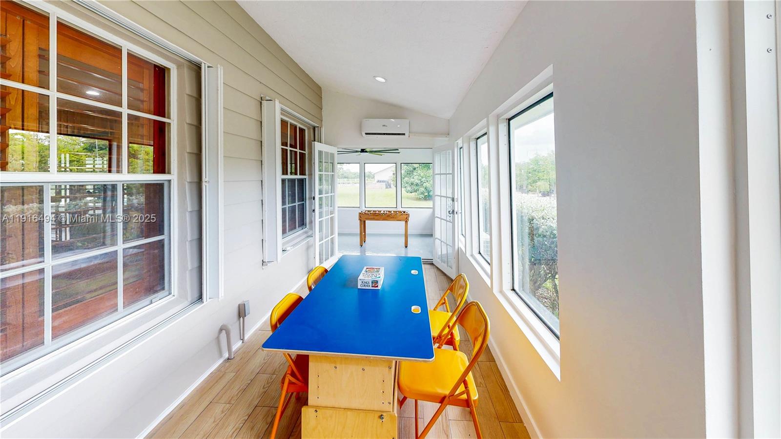 24545 Southwest 192nd Avenue Homestead, FL 33031 - Photo 40 of 91 a front view of a house with wooden floor and furniture