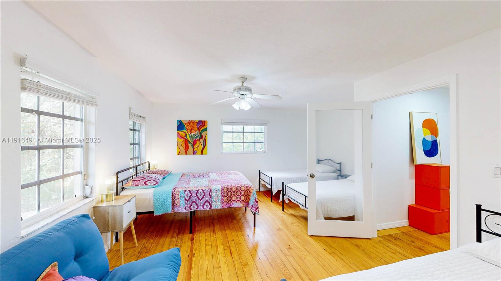 24545 Southwest 192nd Avenue Homestead, FL 33031 - Photo 61 of 91 a living room with furniture and wooden floor