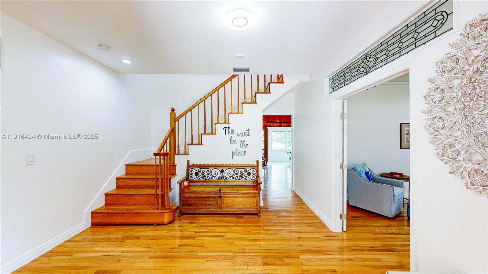 24545 Southwest 192nd Avenue Homestead, FL 33031 - Photo 7 of 91 a view of entryway and hall with wooden floor