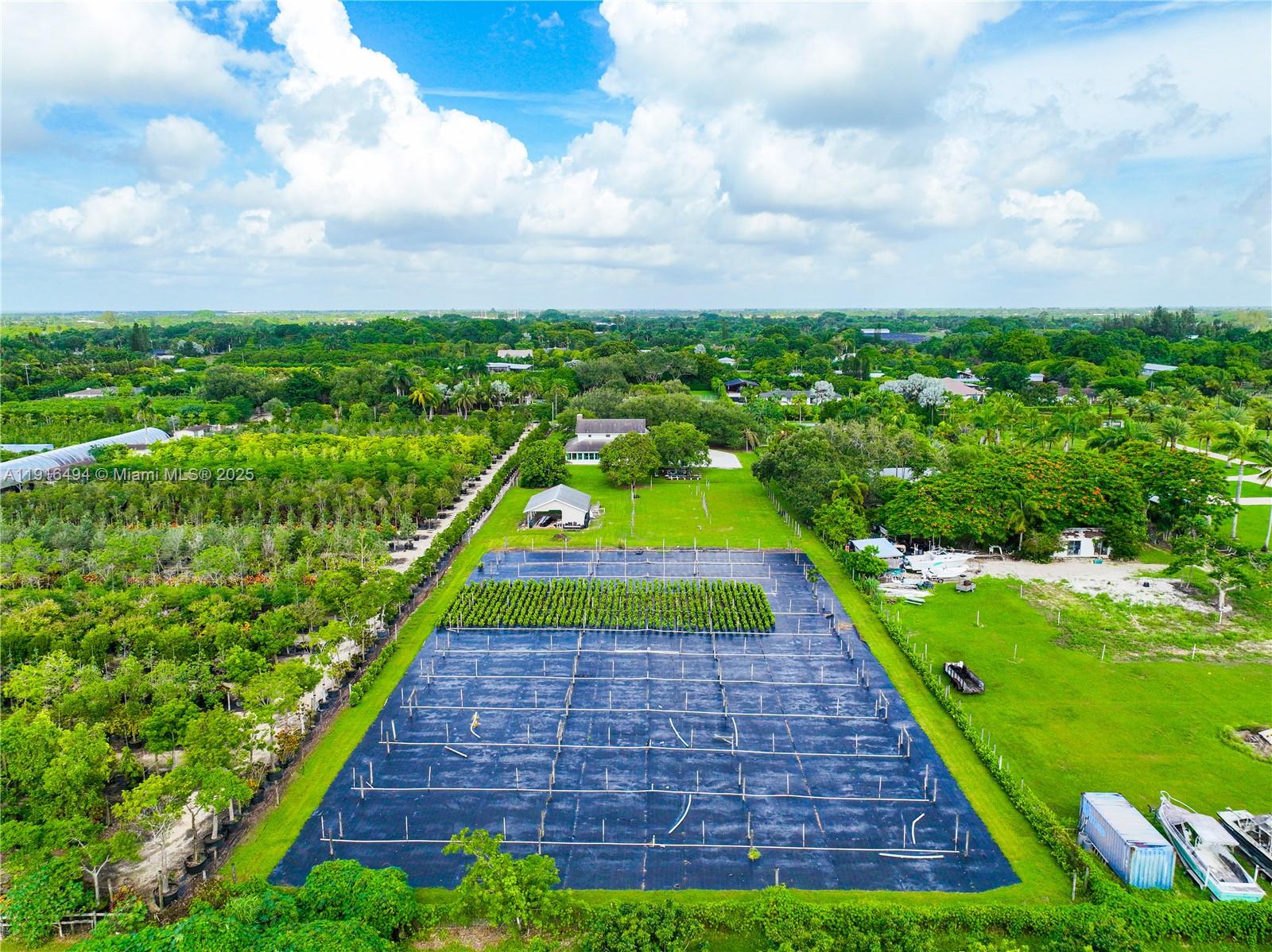 24545 Southwest 192nd Avenue Homestead, FL 33031 - Photo 85 of 91 a view of yard with swimming pool