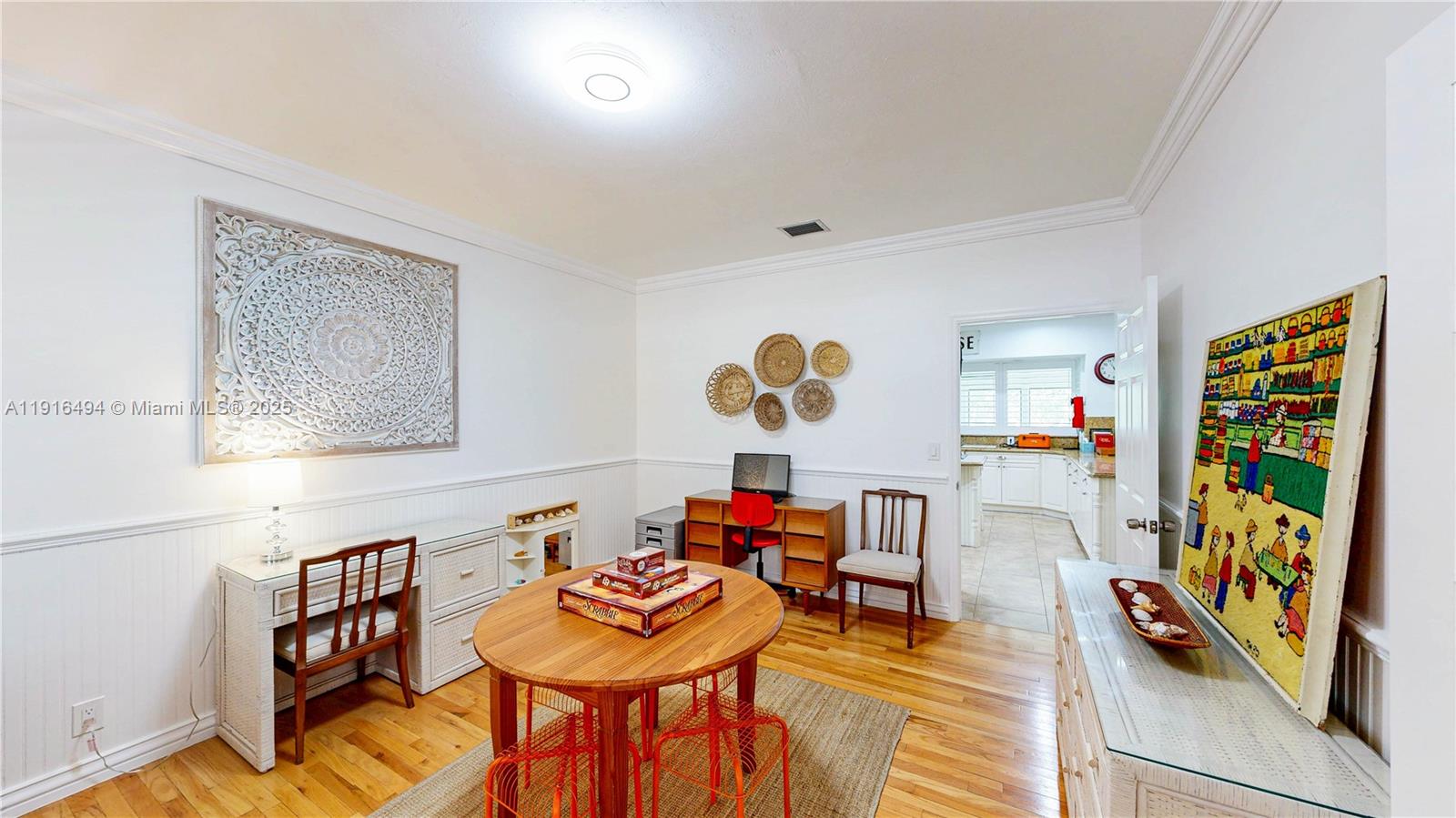 24545 Southwest 192nd Avenue Homestead, FL 33031 - Photo 10 of 91 a living room with furniture and a flat screen tv