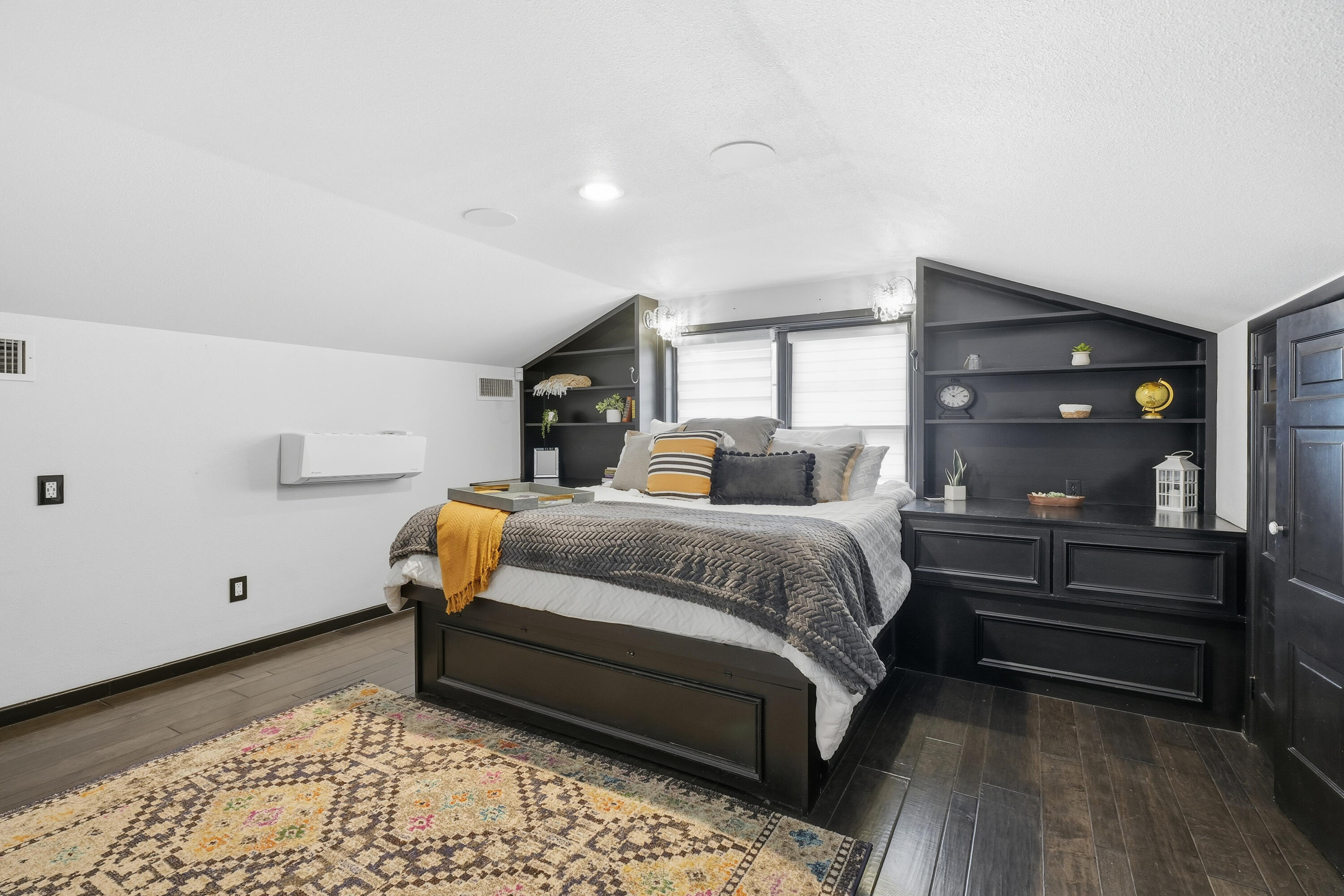 4602 13th Street Lubbock, TX 79416 - Photo 23 of 54 a bedroom with a bed and wooden floor