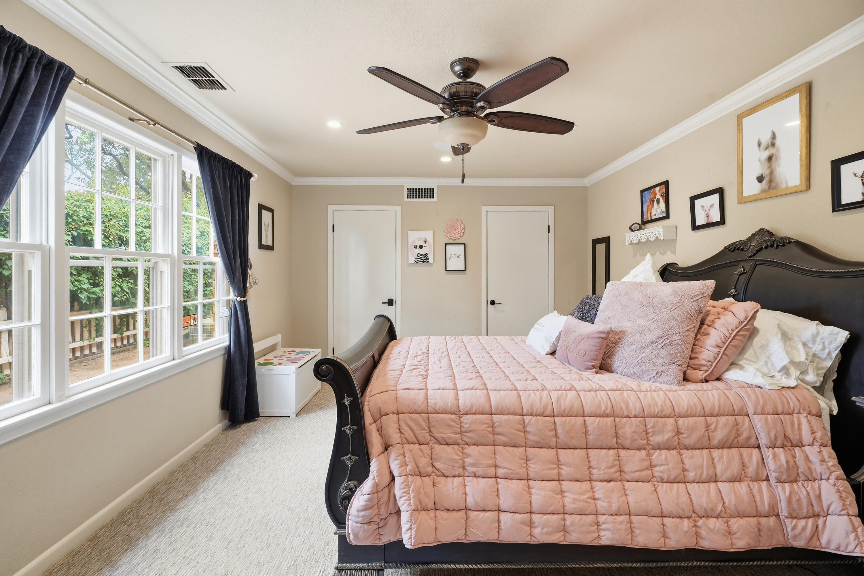 4602 13th Street Lubbock, TX 79416 - Photo 36 of 54 a bedroom with a large bed and a window
