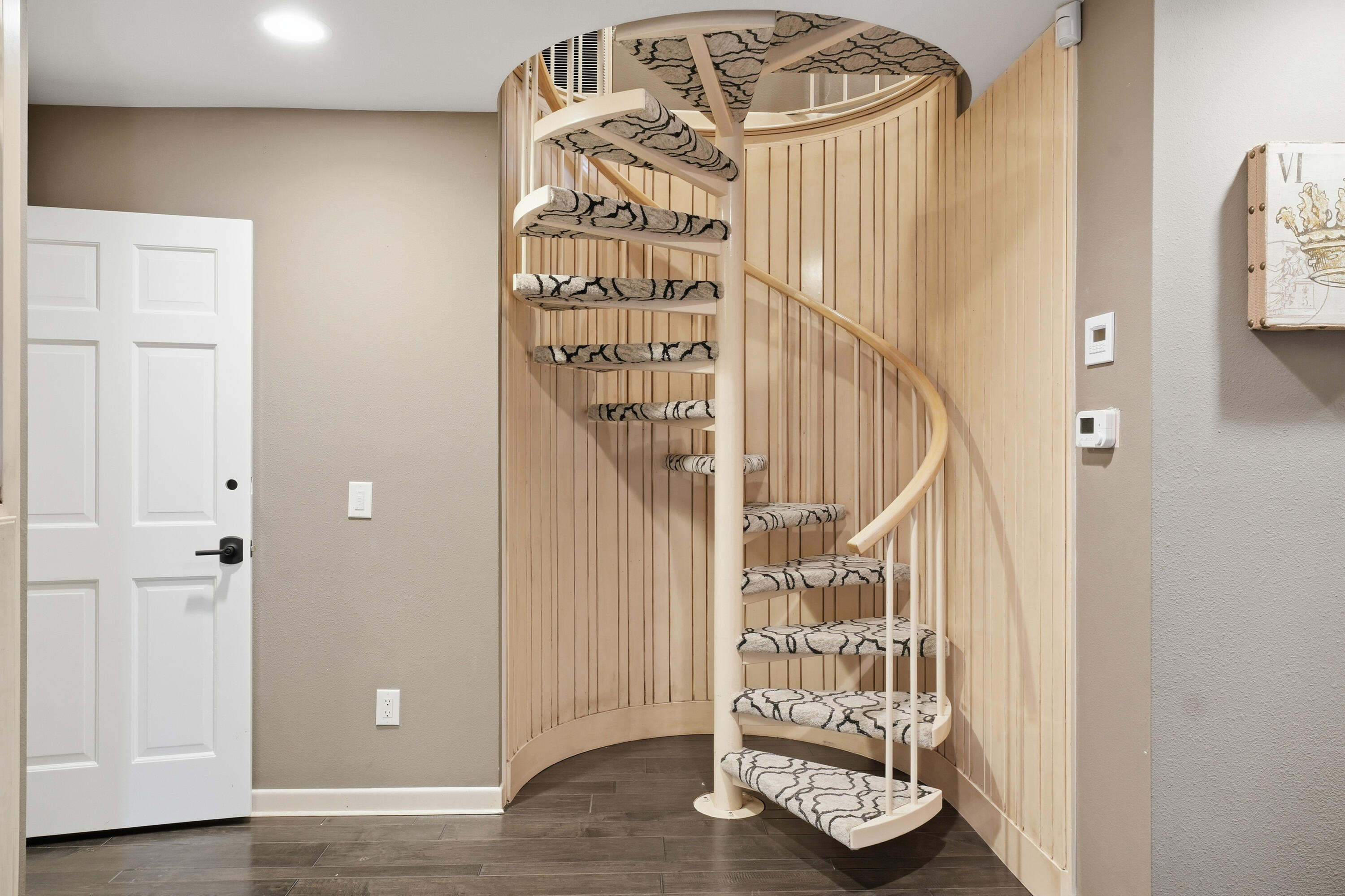 4602 13th Street Lubbock, TX 79416 - Photo 40 of 54 a view of entryway with stairs and wooden floor