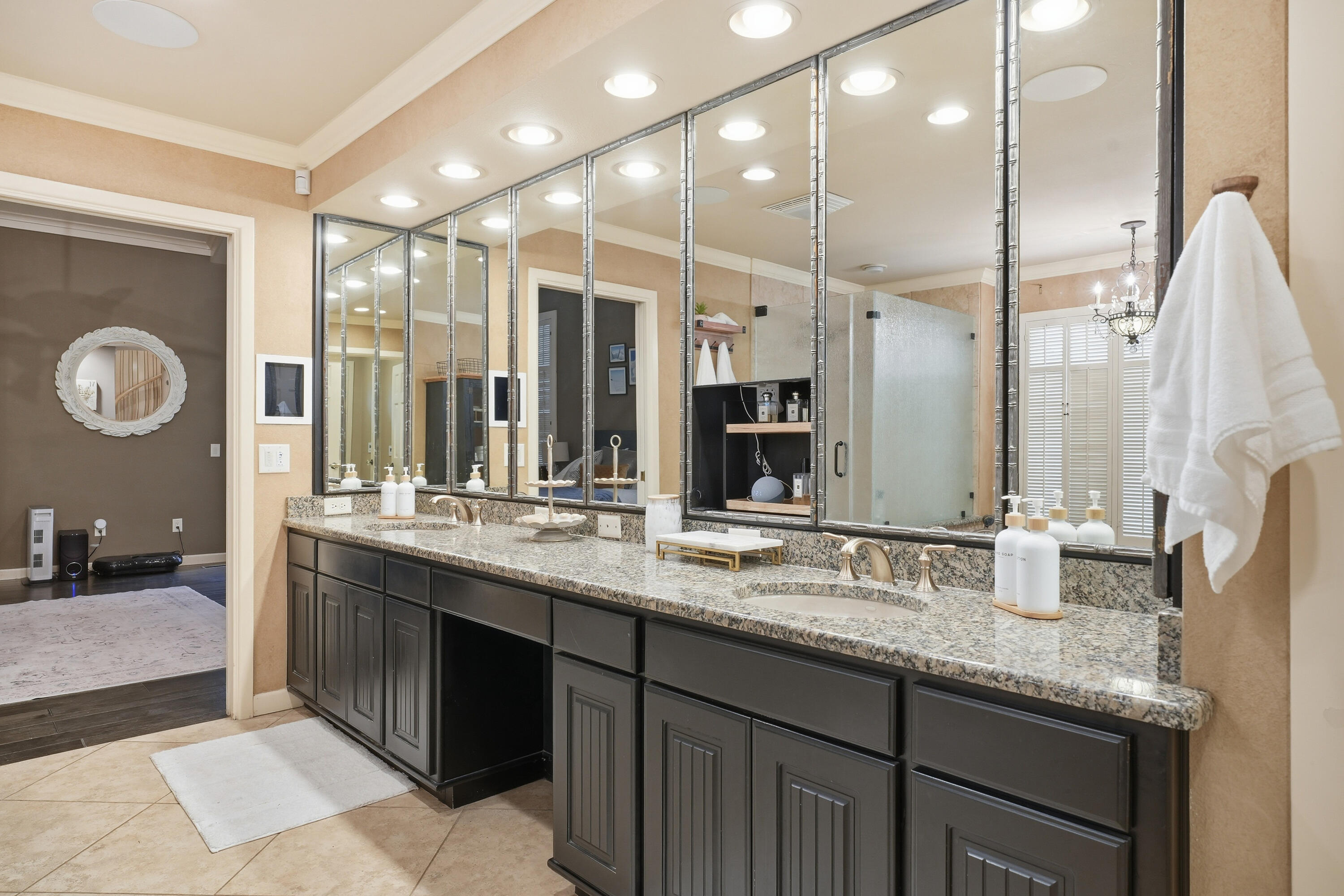 4602 13th Street Lubbock, TX 79416 - Photo 45 of 54 a bathroom with a sink double vanity and a mirror