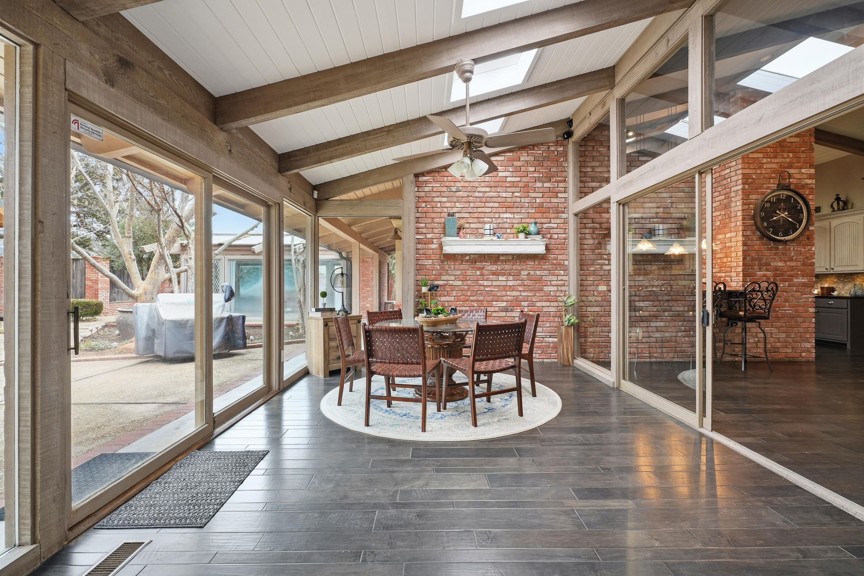 4602 13th Street Lubbock, TX 79416 - Photo 49 of 54 a view of a dining room with furniture window and wooden floor