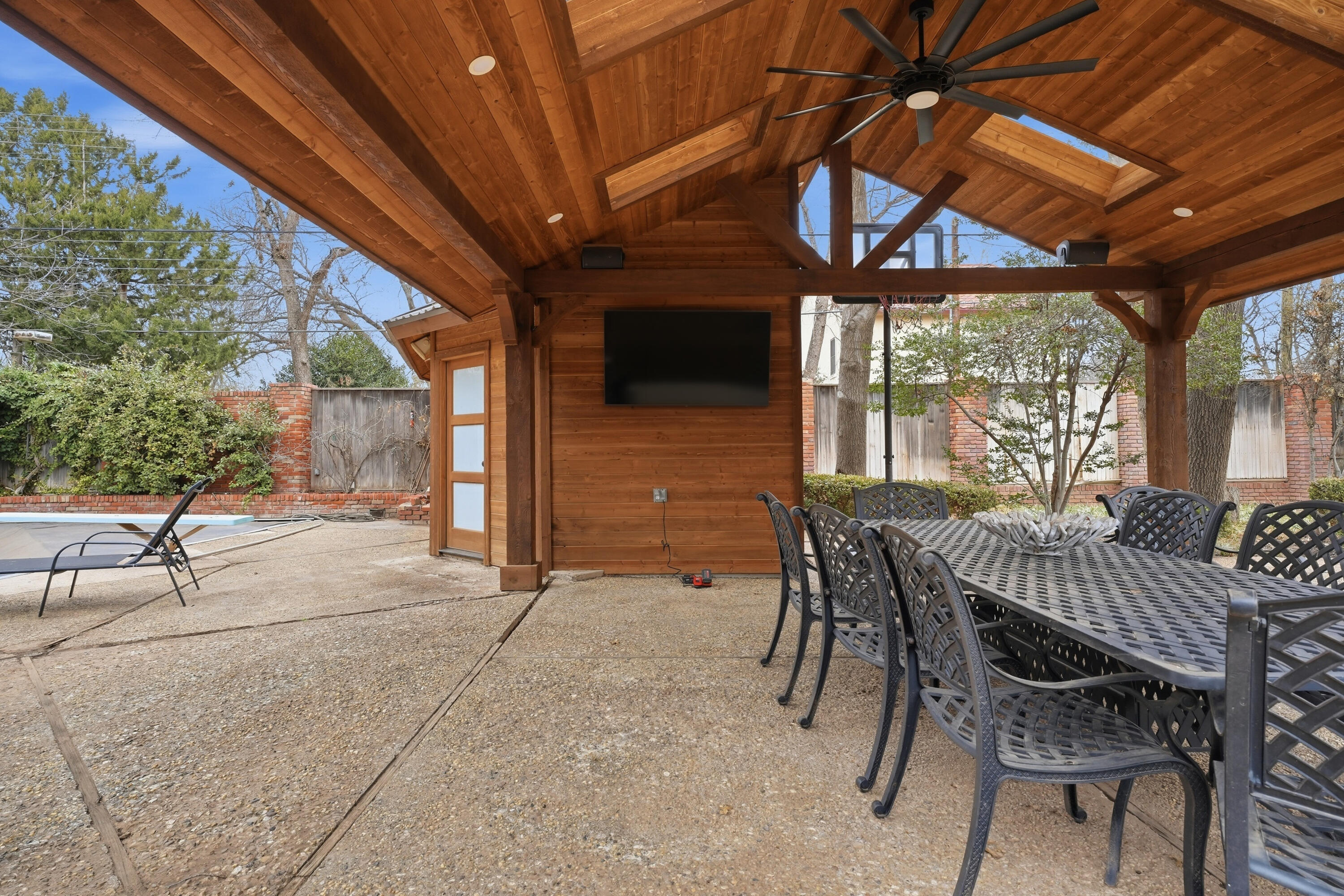4602 13th Street Lubbock, TX 79416 - Photo 52 of 54 a view of a patio with a table and chairs