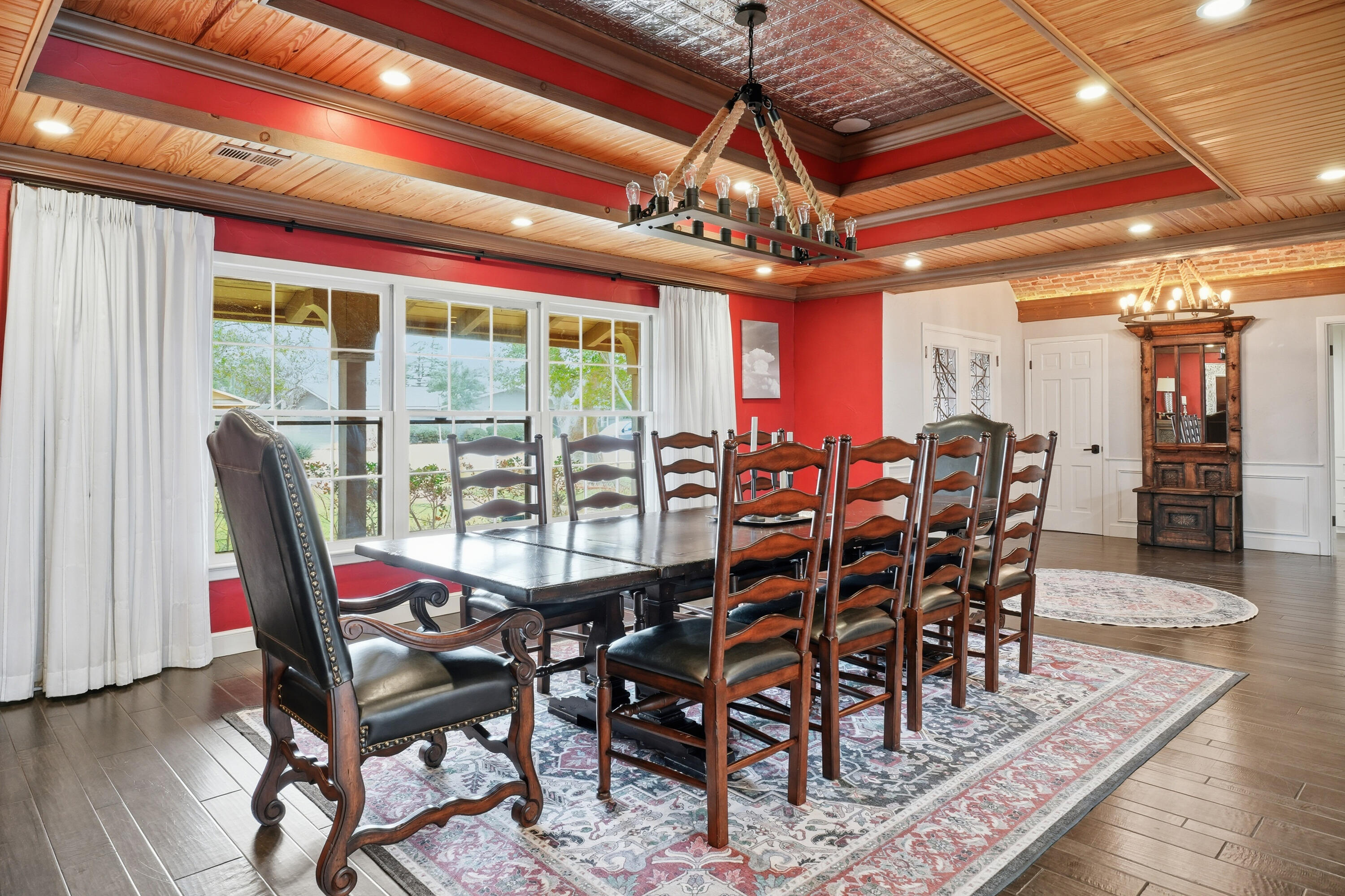 4602 13th Street Lubbock, TX 79416 - Photo 9 of 54 a view of a dining room with furniture window and wooden floor