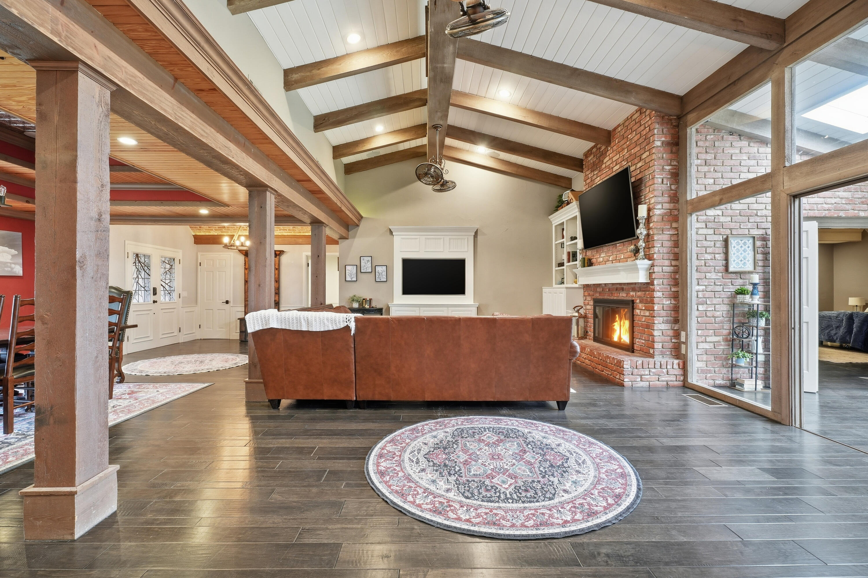 4602 13th Street Lubbock, TX 79416 - Photo 10 of 54 a living room with a couch and wooden floor