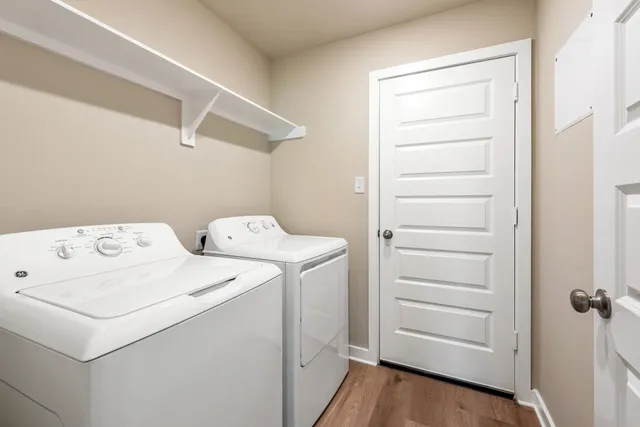 a utility room with dryer and washer