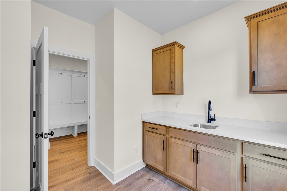 114 Shale Drive Central, SC 29630 - Photo 17 of 24 Laundry Room with sink and extra cabinets