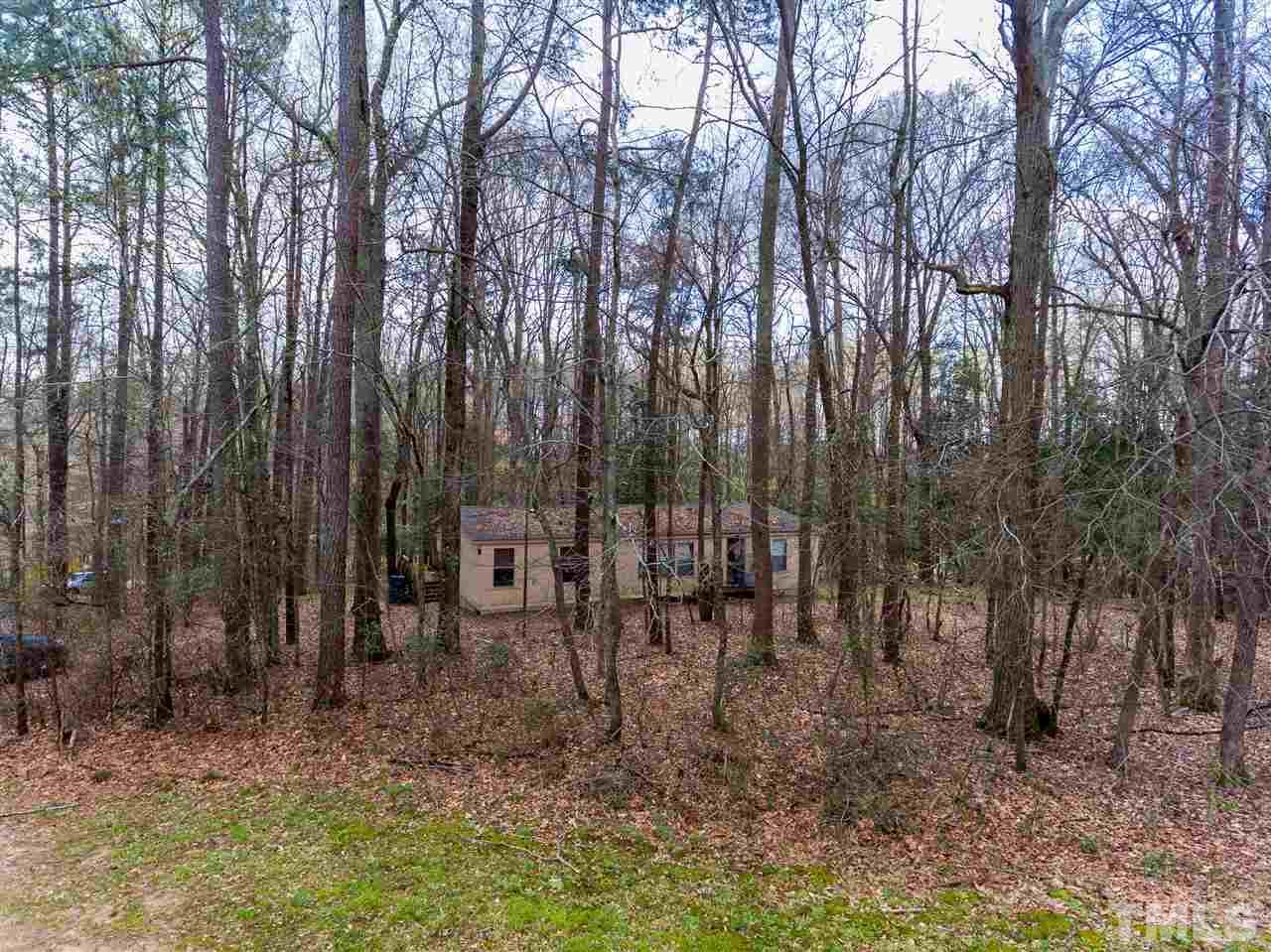 2014 Messer Road Raleigh, NC 27603 - Photo 1 of 27 a view of outdoor space with lots of trees