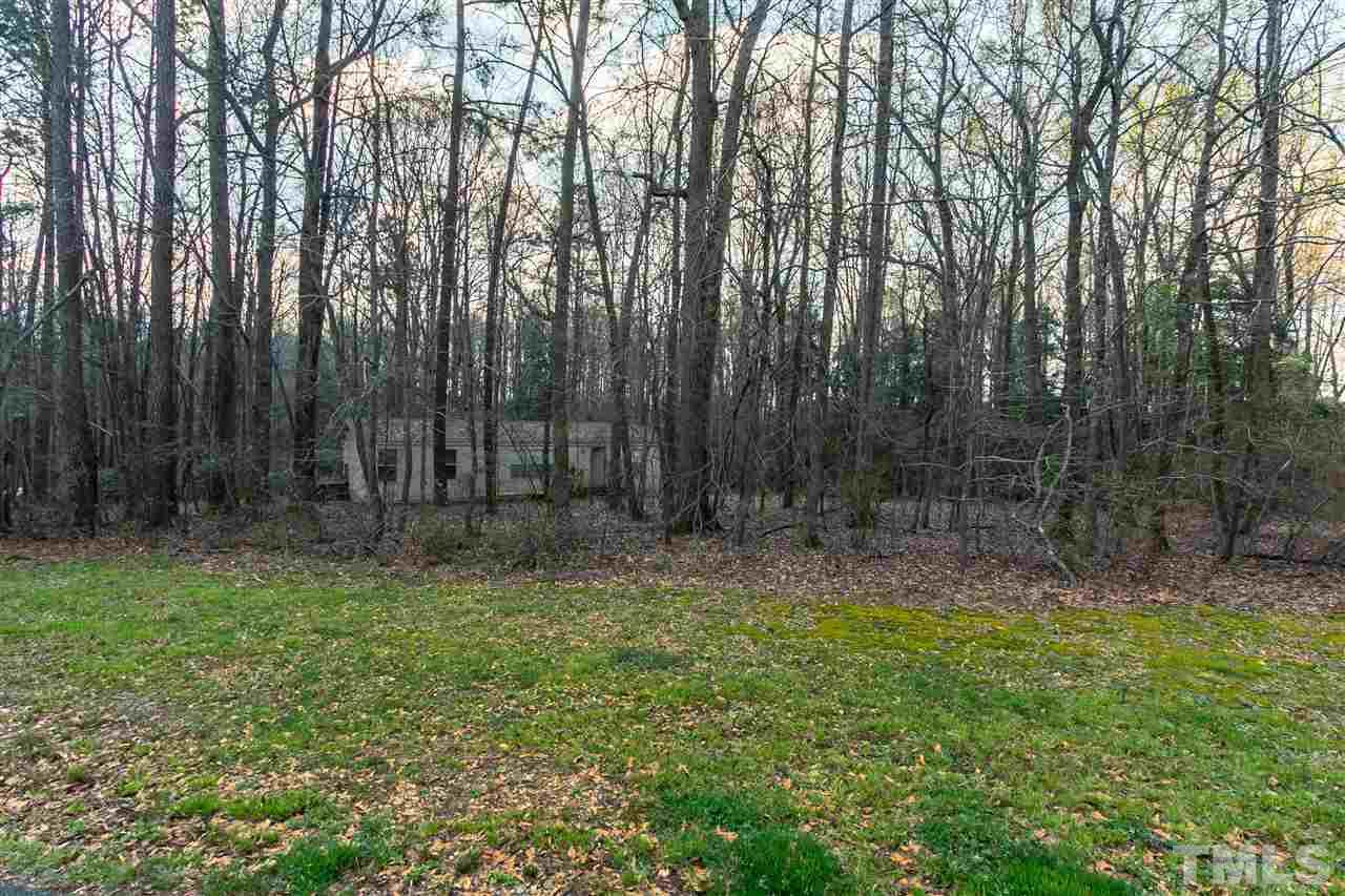 2014 Messer Road Raleigh, NC 27603 - Photo 11 of 27 a view of backyard with green space