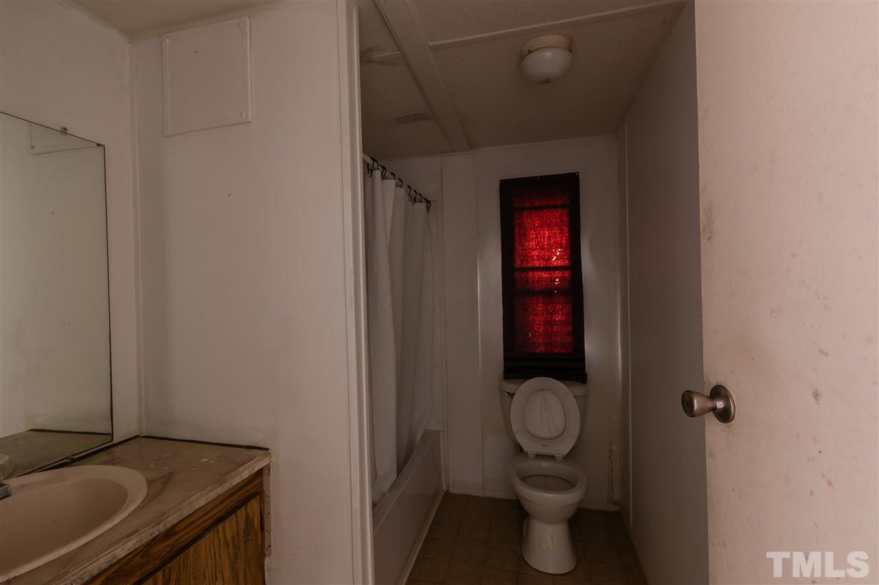 2014 Messer Road Raleigh, NC 27603 - Photo 13 of 27 a bathroom with a toilet