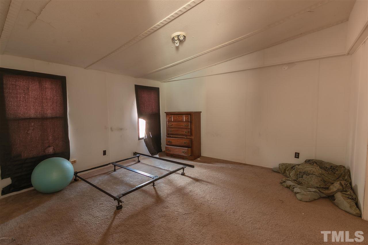 2014 Messer Road Raleigh, NC 27603 - Photo 20 of 27 a view of a room with gym equipment