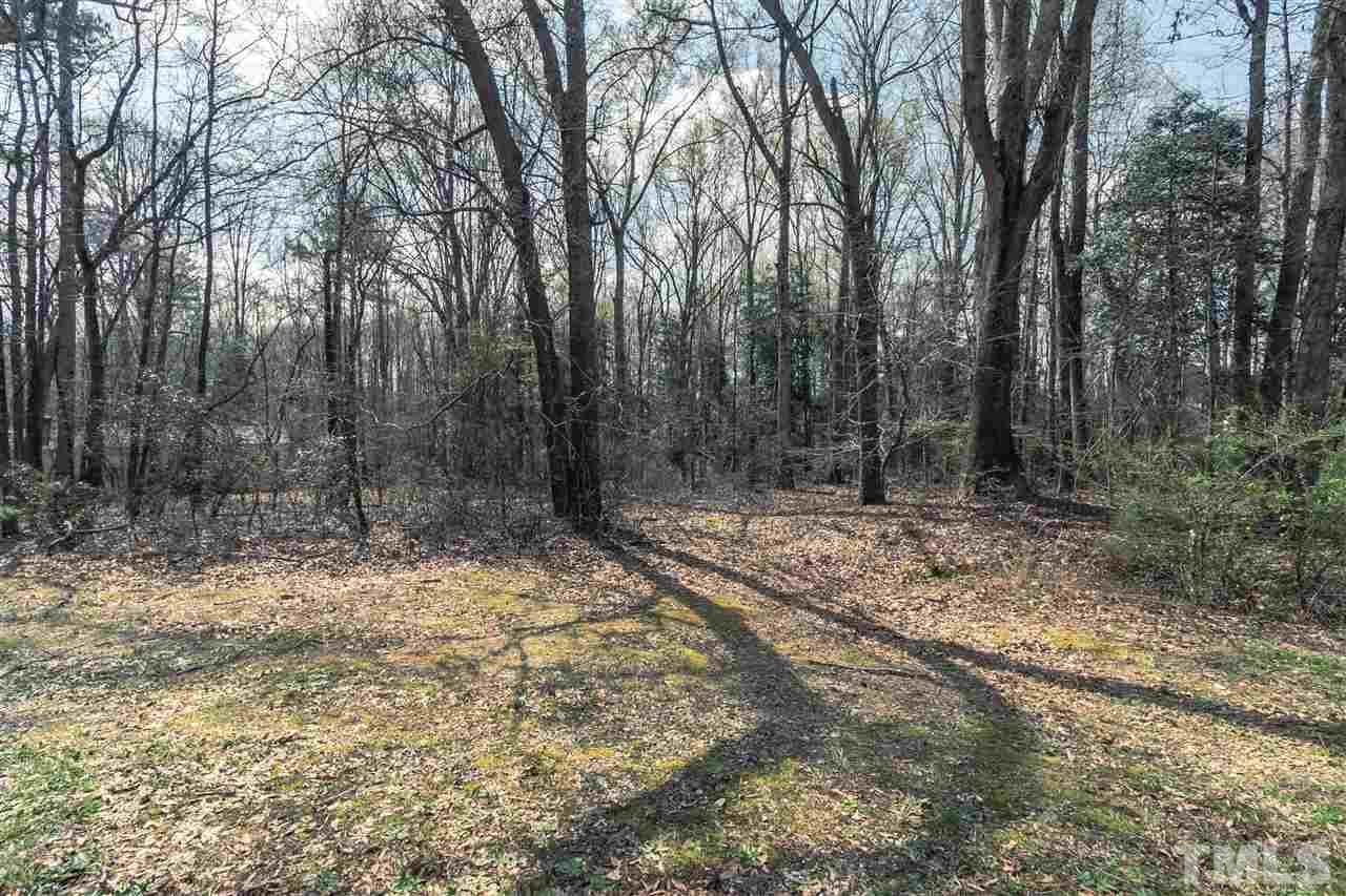 2014 Messer Road Raleigh, NC 27603 - Photo 22 of 27 a view of a yard with trees