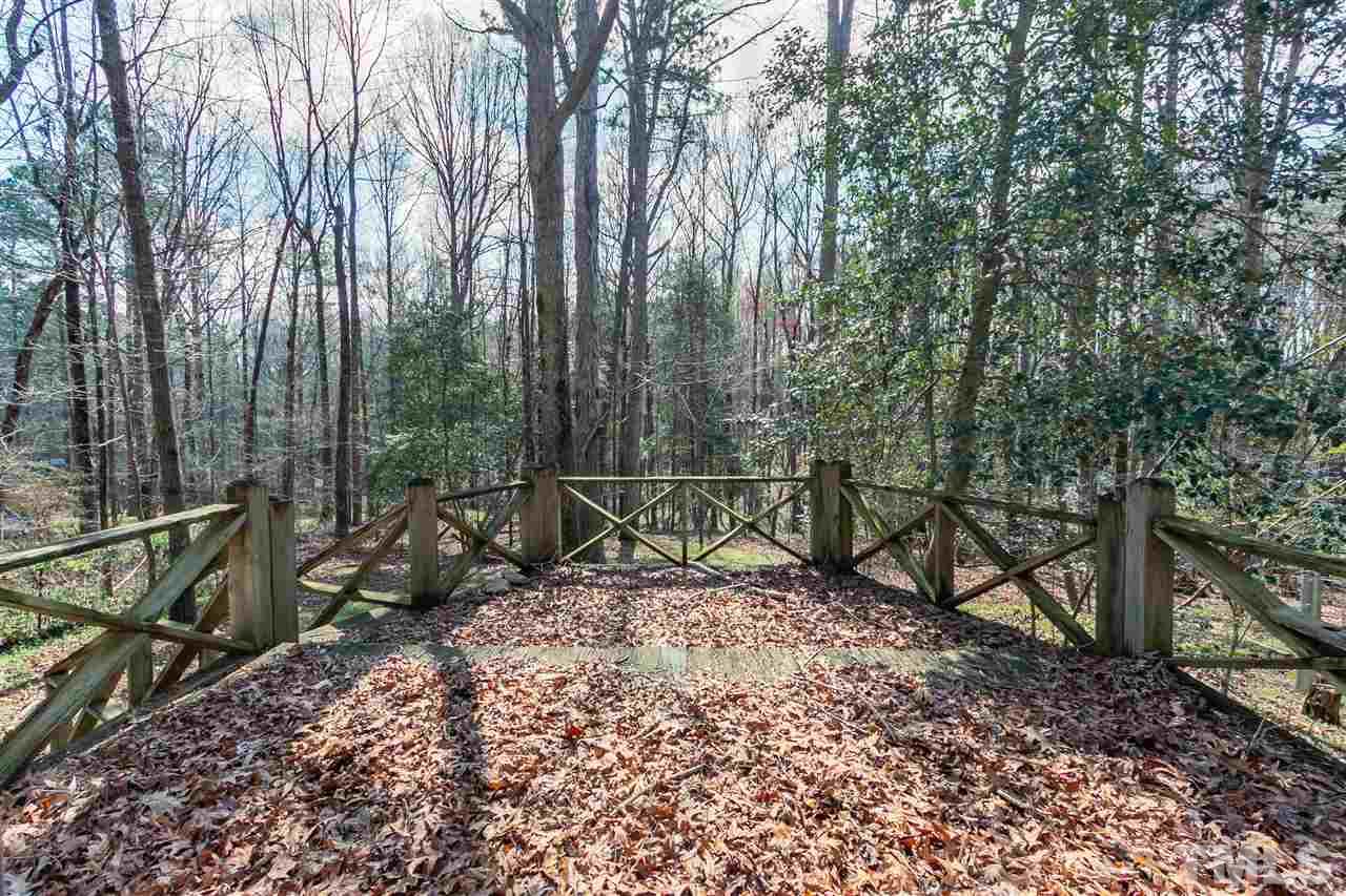 2014 Messer Road Raleigh, NC 27603 - Photo 8 of 27 a view of a bench in the garden
