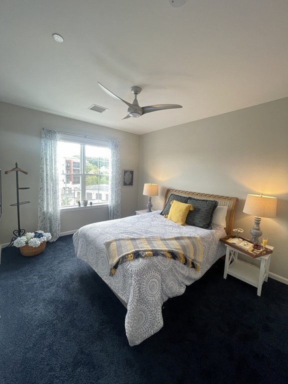 1 Revolution Way, Unit 201 Canton, MA 02021 - Photo 18 of 38 a bedroom with a bed and a window