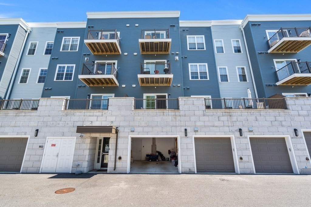 1 Revolution Way, Unit 201 Canton, MA 02021 - Photo 28 of 38 a large building with many windows