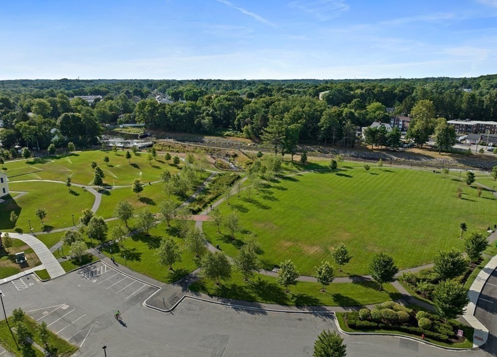 1 Revolution Way, Unit 201 Canton, MA 02021 - Photo 33 of 38 a view of a garden with lawn chairs
