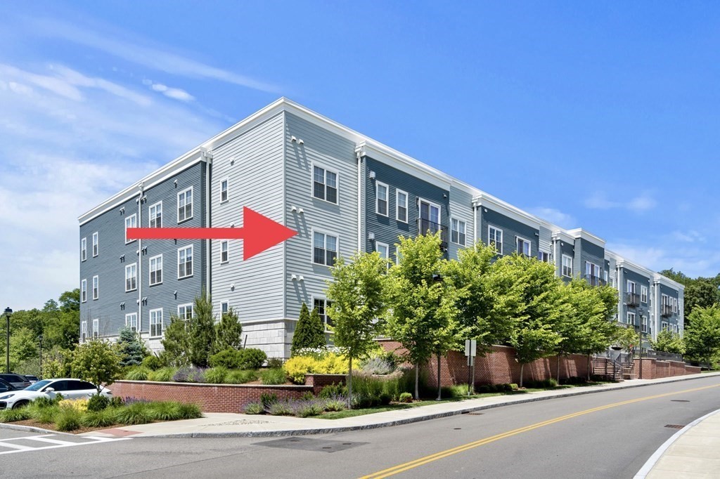 1 Revolution Way, Unit 201 Canton, MA 02021 - Photo 4 of 38 a front view of a house with a yard