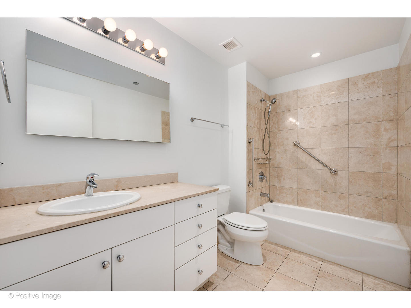 8 East Randolph Street, Unit 2808 Chicago, IL 60601 - Photo 13 of 22 a bathroom with a sink a toilet and a mirror