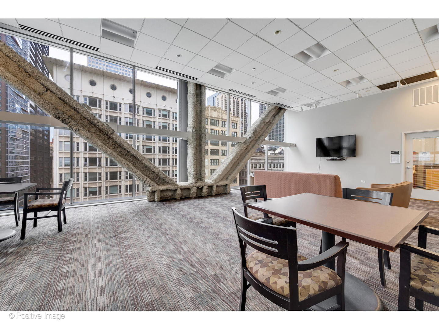8 East Randolph Street, Unit 2808 Chicago, IL 60601 - Photo 20 of 22 a dining room with furniture and stairs