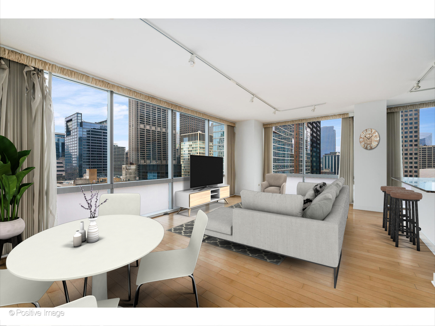 8 East Randolph Street, Unit 2808 Chicago, IL 60601 - Photo 2 of 22 a living room with furniture and a table