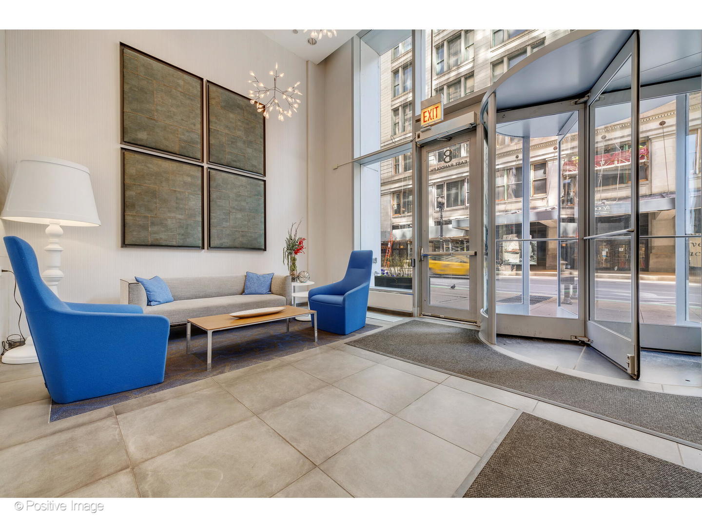 8 East Randolph Street, Unit 2808 Chicago, IL 60601 - Photo 21 of 22 a living room with furniture a rug and white walls