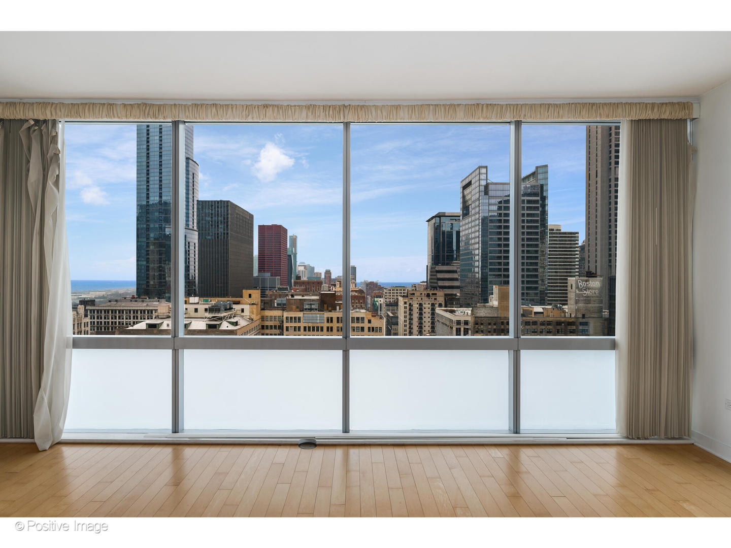 8 East Randolph Street, Unit 2808 Chicago, IL 60601 - Photo 4 of 22 a view of a living room and kitchen
