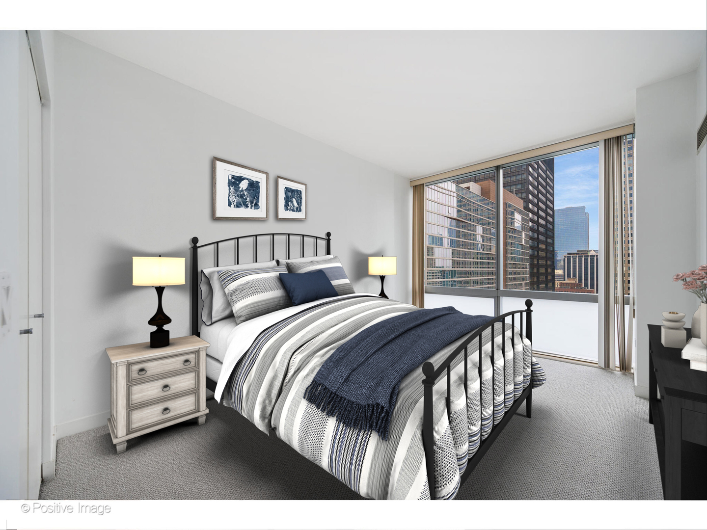 8 East Randolph Street, Unit 2808 Chicago, IL 60601 - Photo 10 of 22 a bedroom with a bed a mirror and a large window