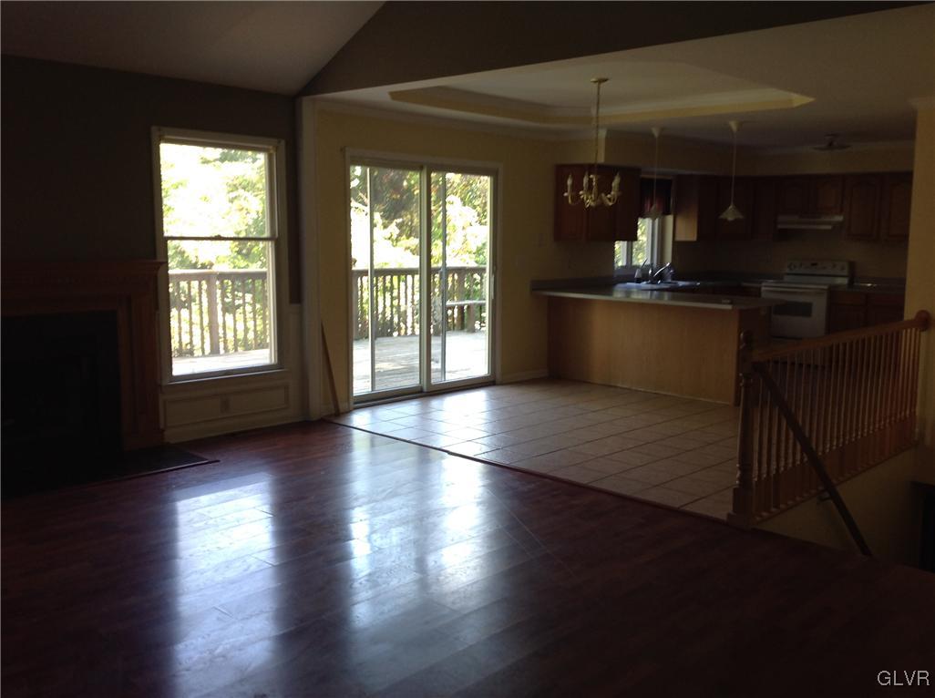 4801 Cedar Grove Road Bangor, PA 18013 - Photo 8 of 12 an empty room with wooden floor and windows
