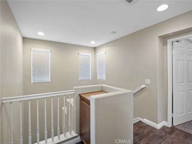a view of entryway with kitchen