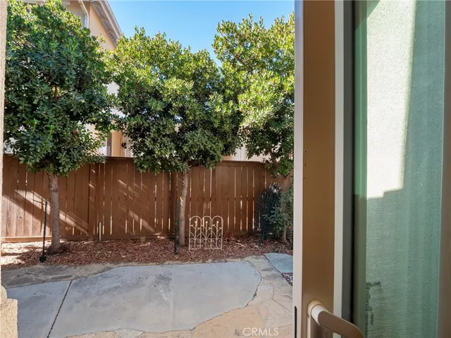 view of backyard with wooden fence