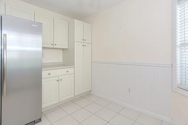 a view of cabinets and window