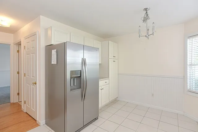 a bathroom with a shower and a mirror