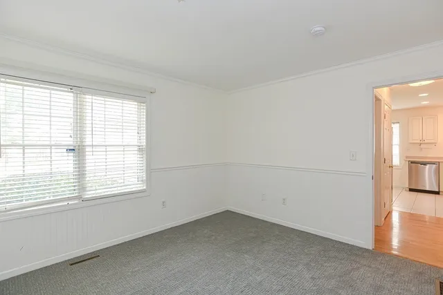 a view of a room that has a window in it