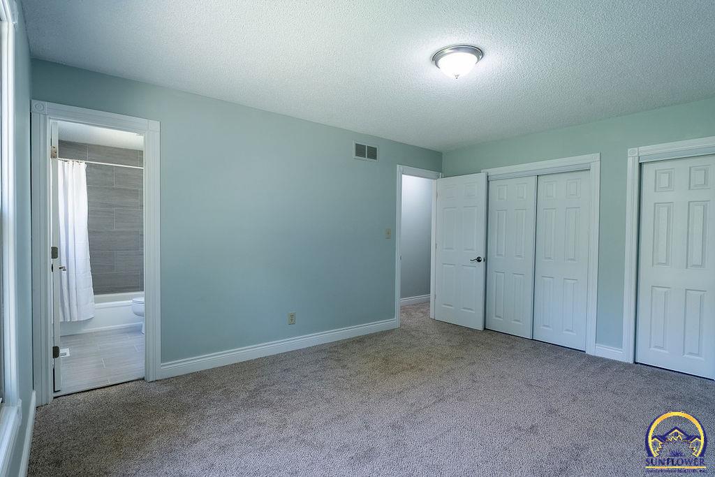 4828 Southwest Cochise Avenue Topeka, KS 66614 - Photo 16 of 35 Bedroom 1
