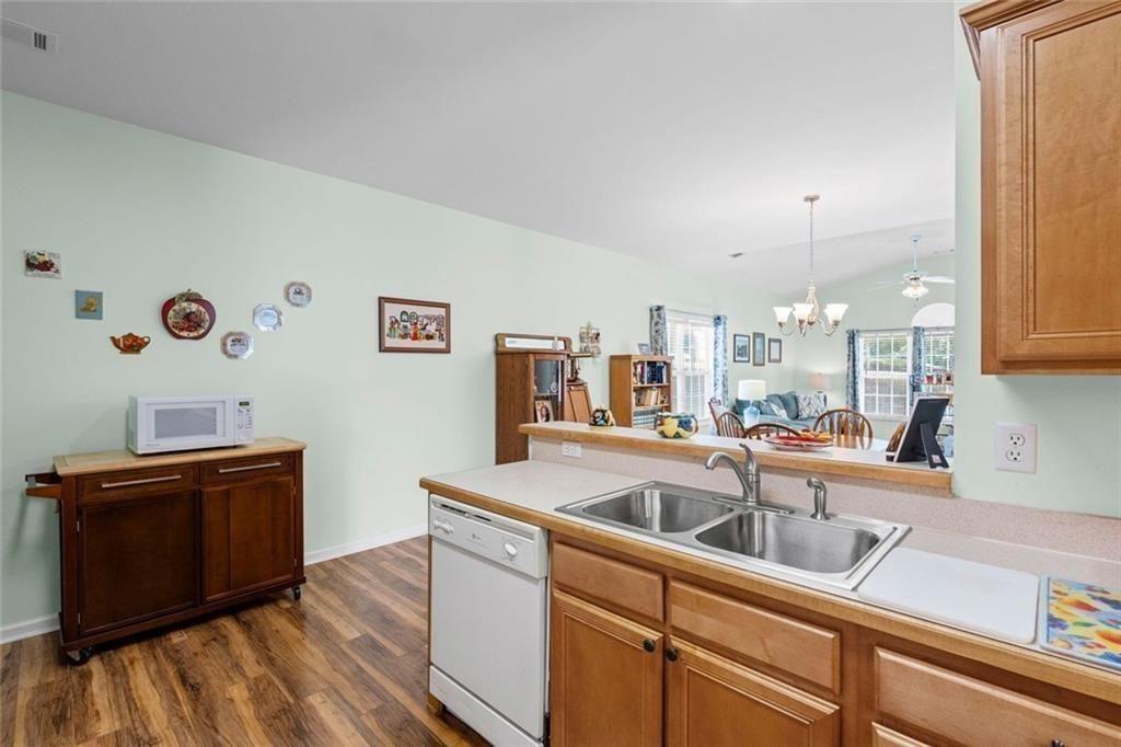 460 Tribble Gap Road, Unit 102 Cumming, GA 30040 - Photo 11 of 21 a very nice looking room with a large window