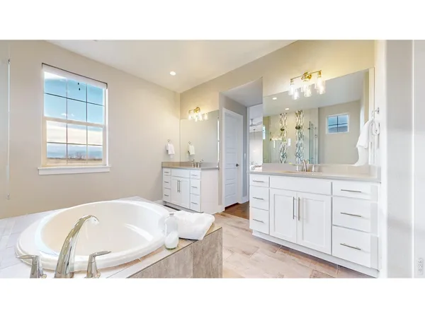 a kitchen with sink and cabinets