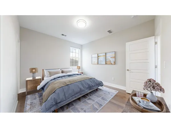 a living room with a bed and a couch