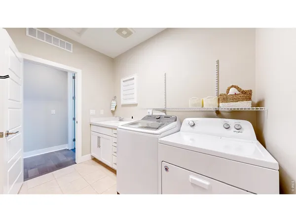 a bathroom with a sink a mirror and a shower