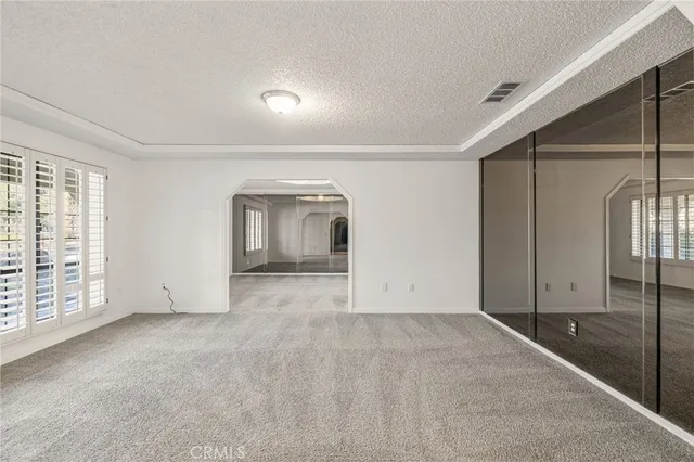 a spacious bathroom with a double vanity sink and a bathtub