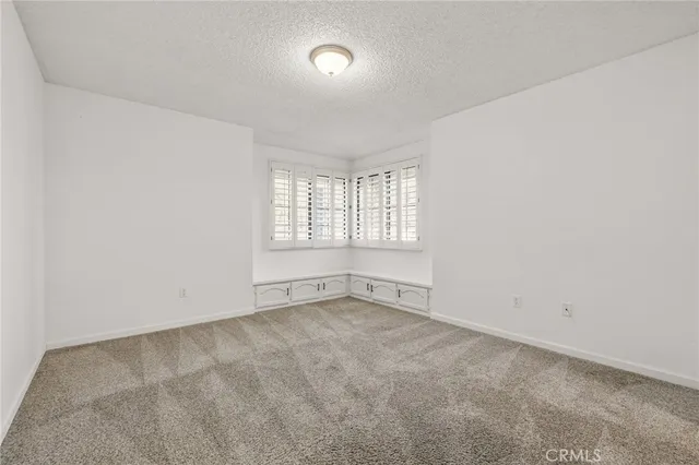 a view of a house with a swimming pool