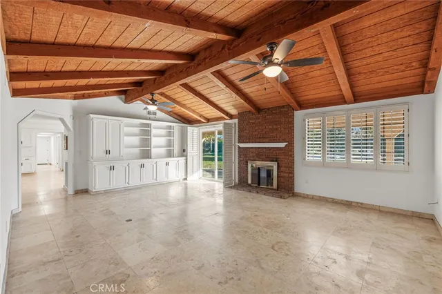a view of empty room with windows