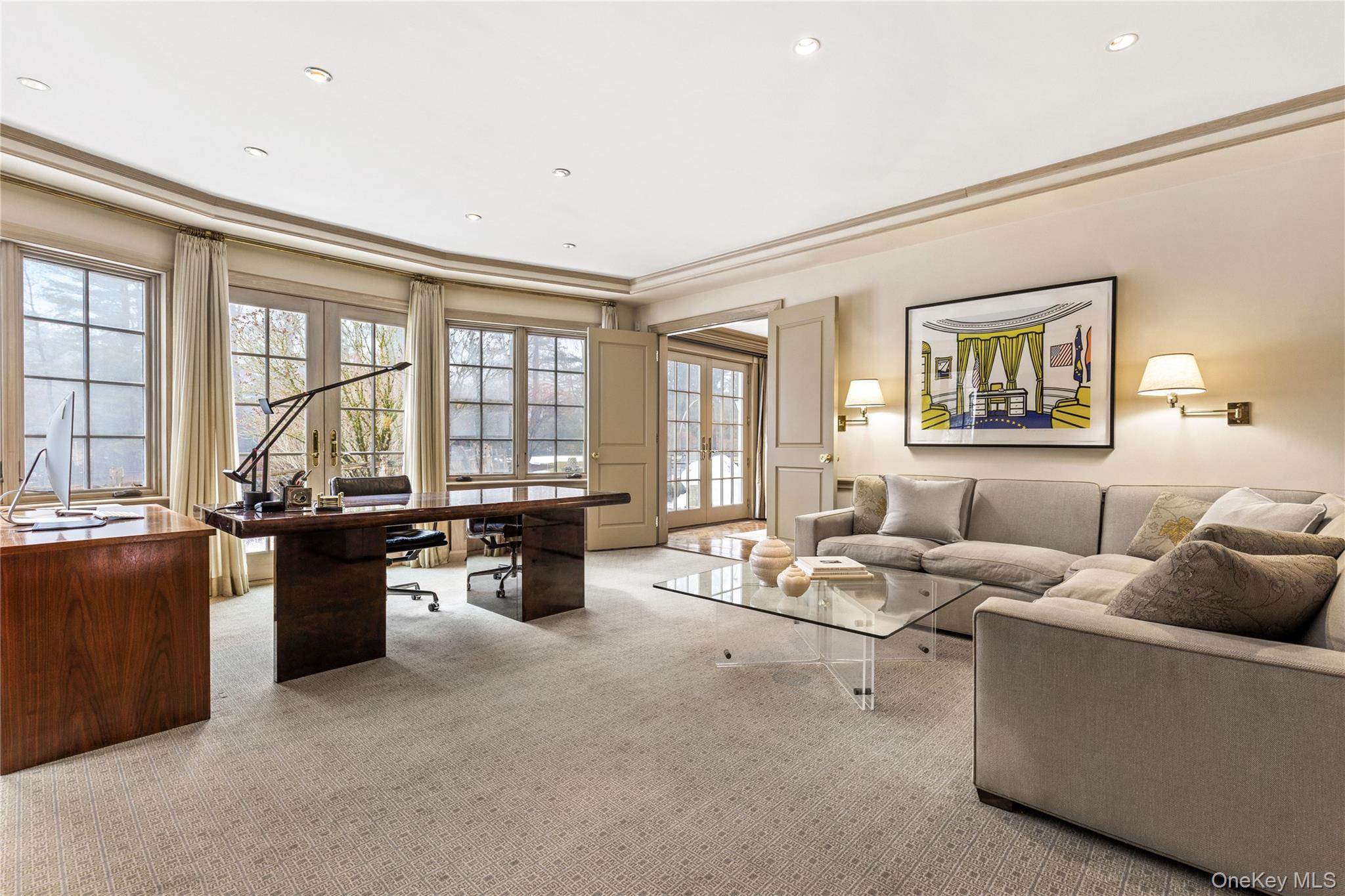 25 Stratford Road Harrison, NY 10528 - Photo 13 of 47 a living room with furniture and large windows
