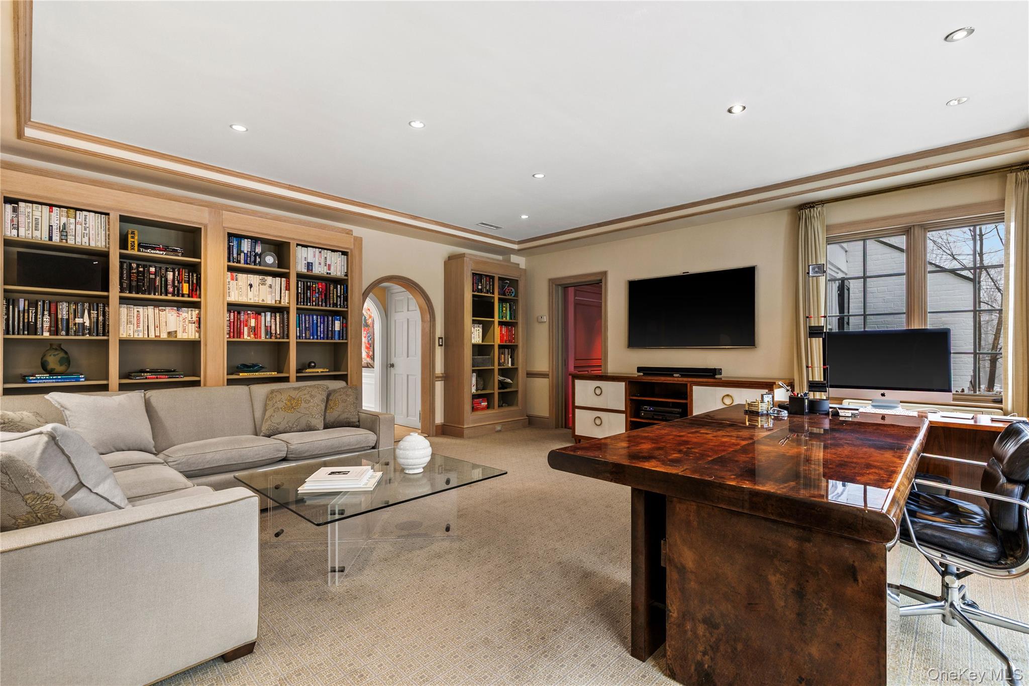 25 Stratford Road Harrison, NY 10528 - Photo 14 of 47 a room with furniture and a flat screen tv