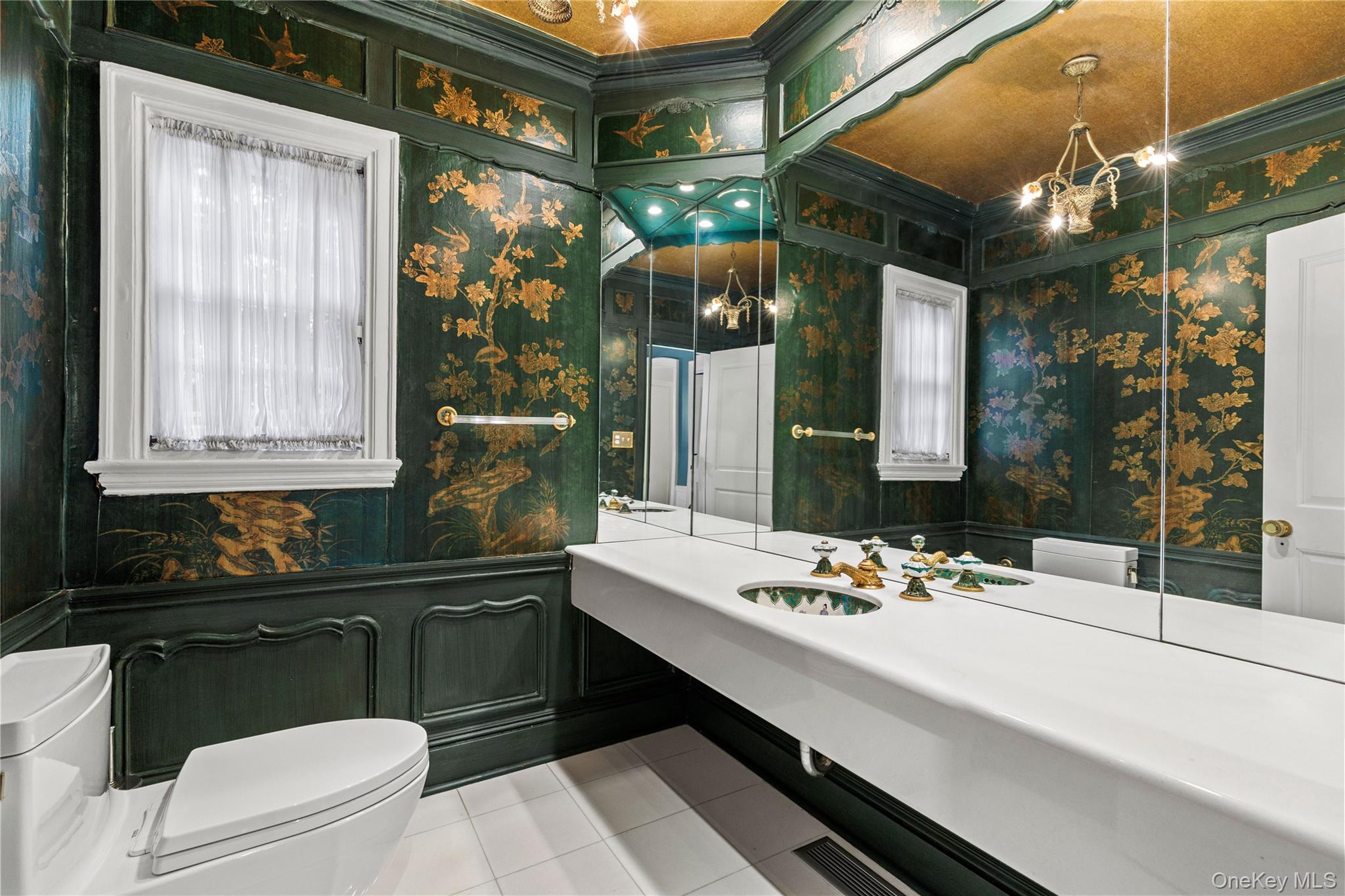 25 Stratford Road Harrison, NY 10528 - Photo 17 of 47 a bathroom with a sink vanity granite and a mirror