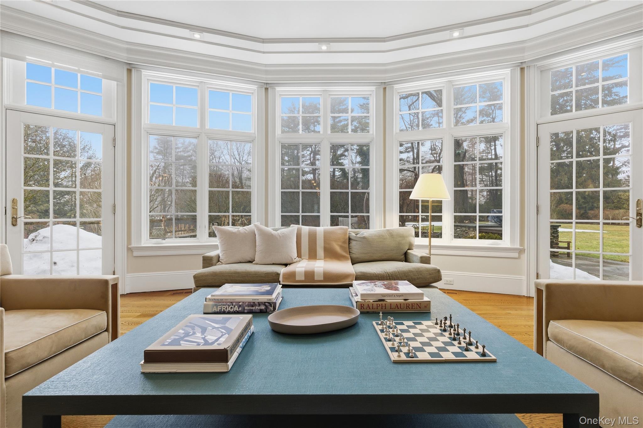 25 Stratford Road Harrison, NY 10528 - Photo 25 of 47 a living room with furniture and a large window